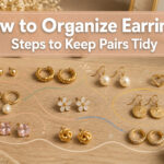 An assortment of earrings displayed in an organized fashion.