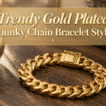 Various trendy gold plated chunky chain bracelets displayed together.